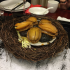 Abalone on a bed of mushrooms served in a nest