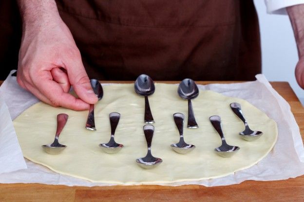 Place small spoons onto the puff pastry sheet
