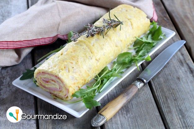 Giant rolled omelet stuffed with ham and cheese