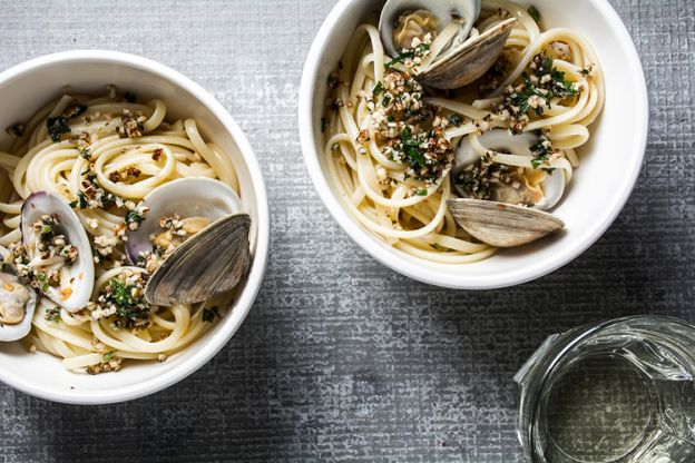 Linguine with clams and almonds and herbs