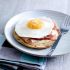 Potato and buckwheat pancakes topped with ham, egg and cheese