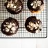 Dark chocolate and malt custard filled doughnuts