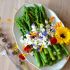Green asparagus, goat cheese and flowers with an orange vinaigrette