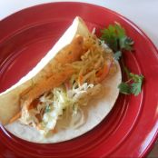 Chipotle Grilled Salmon Tacos topped with Cilantro Cole Slaw