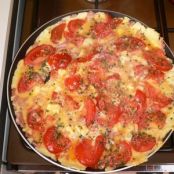 Omelette with cherry tomatoes and shallots