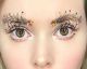 Why Stop At The Sweater When You Can Wear Christmas Eyebrows?