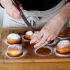 Slit each donut