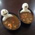 Rice figures in a Japanese soup bath