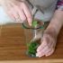 Place the mint leaves in each glass