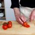 Slice the tomatoes
