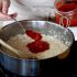 Add the tomato puree