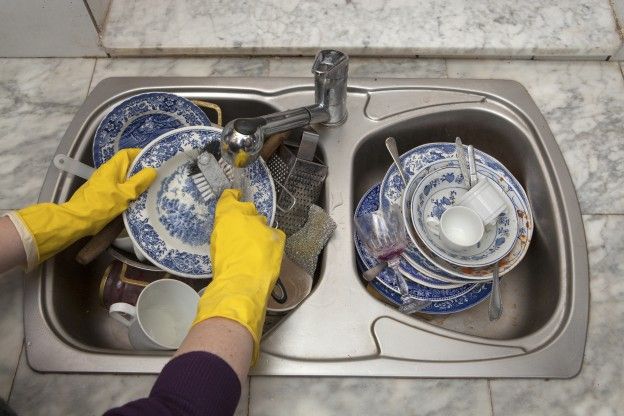 The mountains of dishes in the kitchen sink