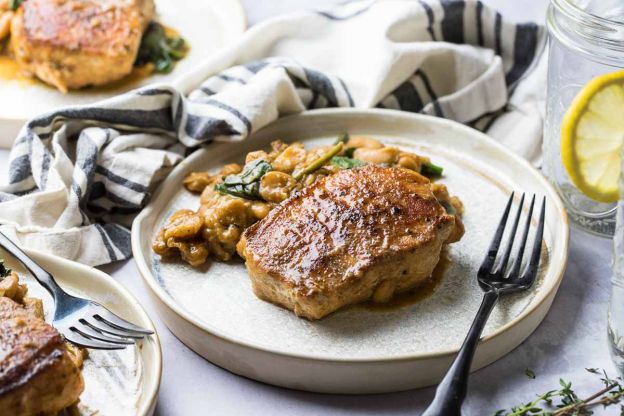 Pork Chop Skillet Dinner with Spinach and White Beans