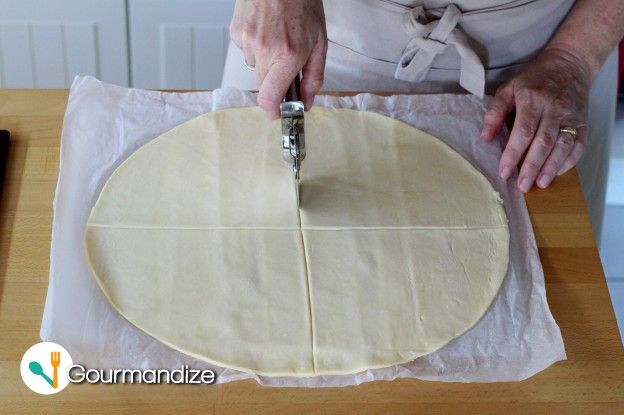Cut the puff pastry into quarters