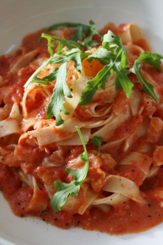 Vodka and tomato pasta with smoked salmon