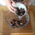 Pour the chocolate squares into a glass bowl and melt in a double boiler