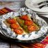 Foil-baked salmon with basil pesto and tomatoes
