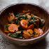 Roasted persimmons with mushrooms and kale