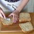 Butter the bread slices on both sides