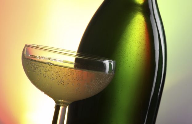 Open your champagne with a kitchen towel