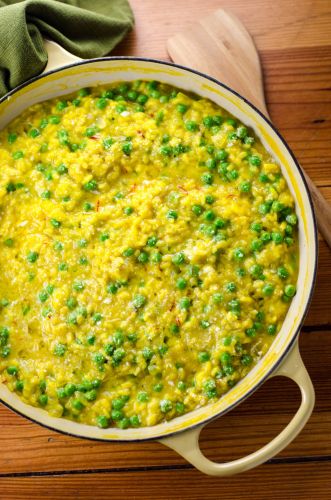 Saffron risotto with peas and goat cheese