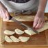 Wait 5 minutes, then slice the warm rolls at an angle into 1.5-cm thick pieces