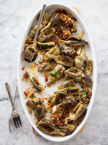ROASTED artichokes with chorizo dressing