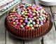 The ultimate M&M and chocolate finger birthday cake