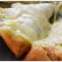 85. Three cheese white pizza