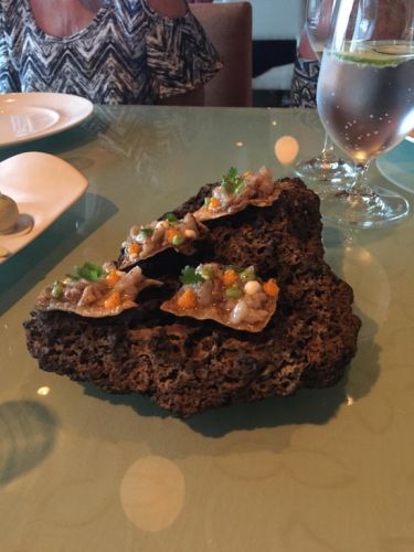 Crackers served on a rock