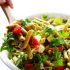 Pasta salad with roasted red peppers, arugula, mozzarella and basil pesto