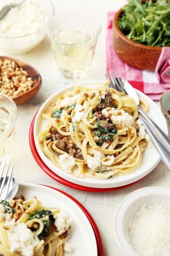 Creamed Spinach Pasta with Sausage and Pine Nuts