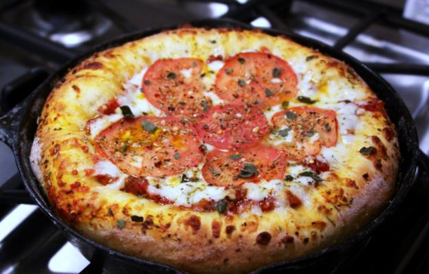 Black iron skillet deep dish pizza