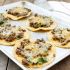 Beef, black bean, and spinach toastadas