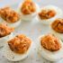 Bacon Deviled Eggs With Caramelized Onions And Cheddar Cheese