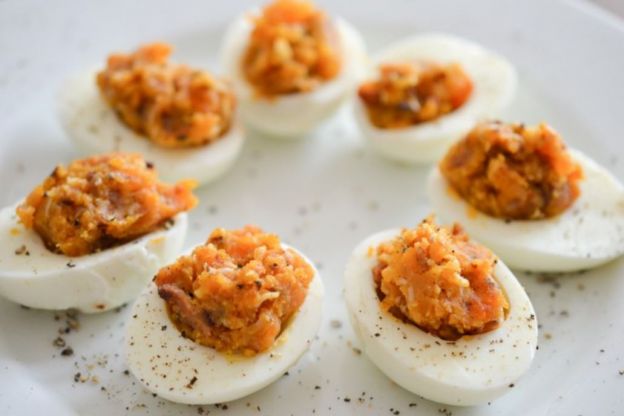 Bacon Deviled Eggs With Caramelized Onions And Cheddar Cheese