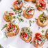 Crostini with Canned Sardines, Sherry Pickled Chiles and Herbs