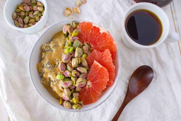 Breakfast Oatmeal Bowl with Grapefruit, Pistachios and Sweet Tahini Drizzle