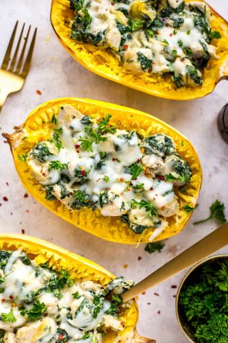 Chicken Spinach and Artichoke Stuffed Spaghetti Squash Boats