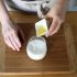 Combine the cream and the honey and heat until the mixture is simmering