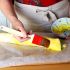 Brush the rolled puff pastry with the mixture of egg yolk and milk