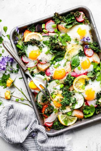 Sheet pan roasted spring vegetables with baked eggs