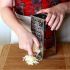 Grate the sharp white cheddar