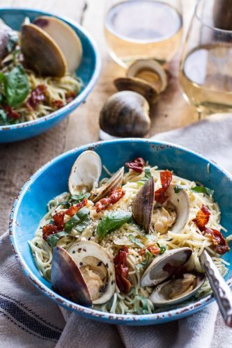 Fresh Clam Pasta With Creamy White Basil Sauce And Crispy Proscuitto
