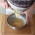 Pour in the majority of the remaining egg mixture and whisk again until the mixture forms a point and does not drip when lifted up by the whisk