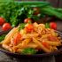 Penne with chicken, tomatoes and pesto