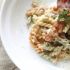 Tricolor pasta in Parmesan cream sauce with bacon