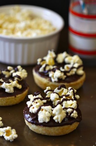 Baked Doughnuts With Chocolate Glaze And Popcorn
