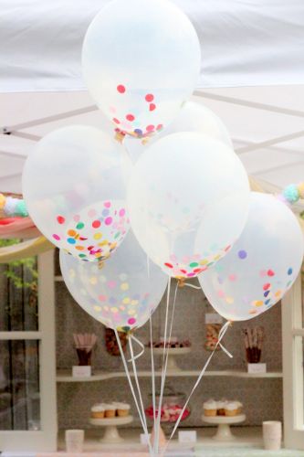 Decorate with confetti-filled balloons
