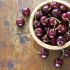 Pit Cherries With A Beer Bottle